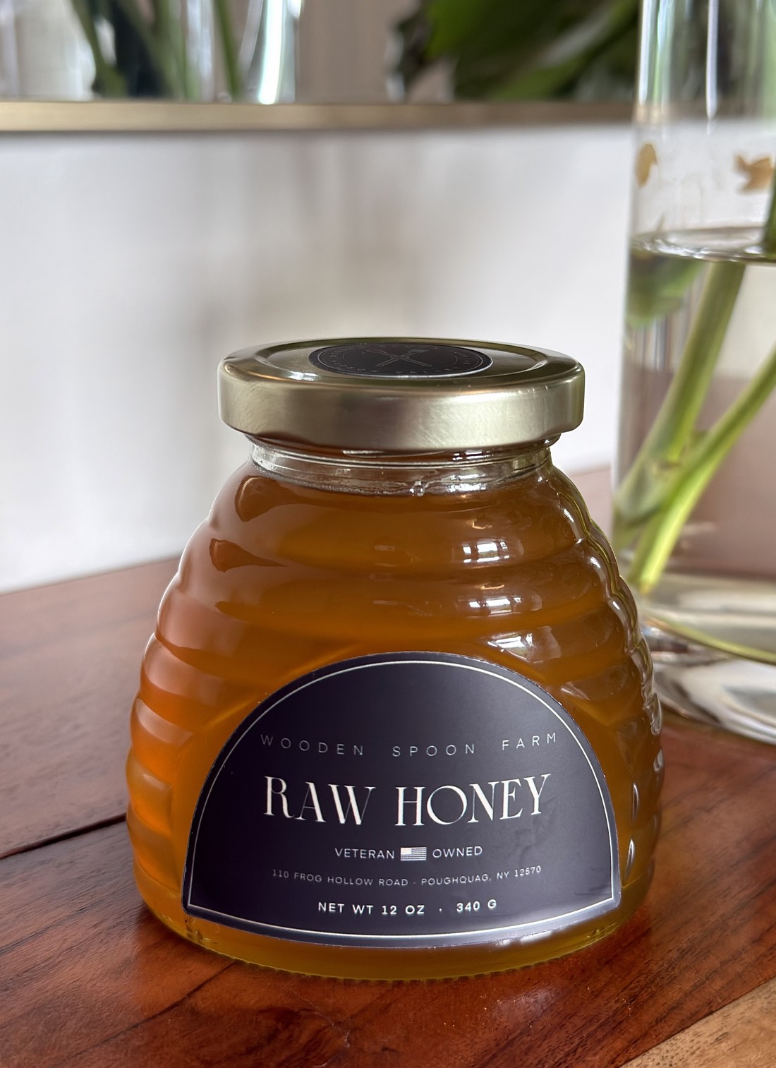 The Skep — 12 oz raw honey in a half-skep glass jar